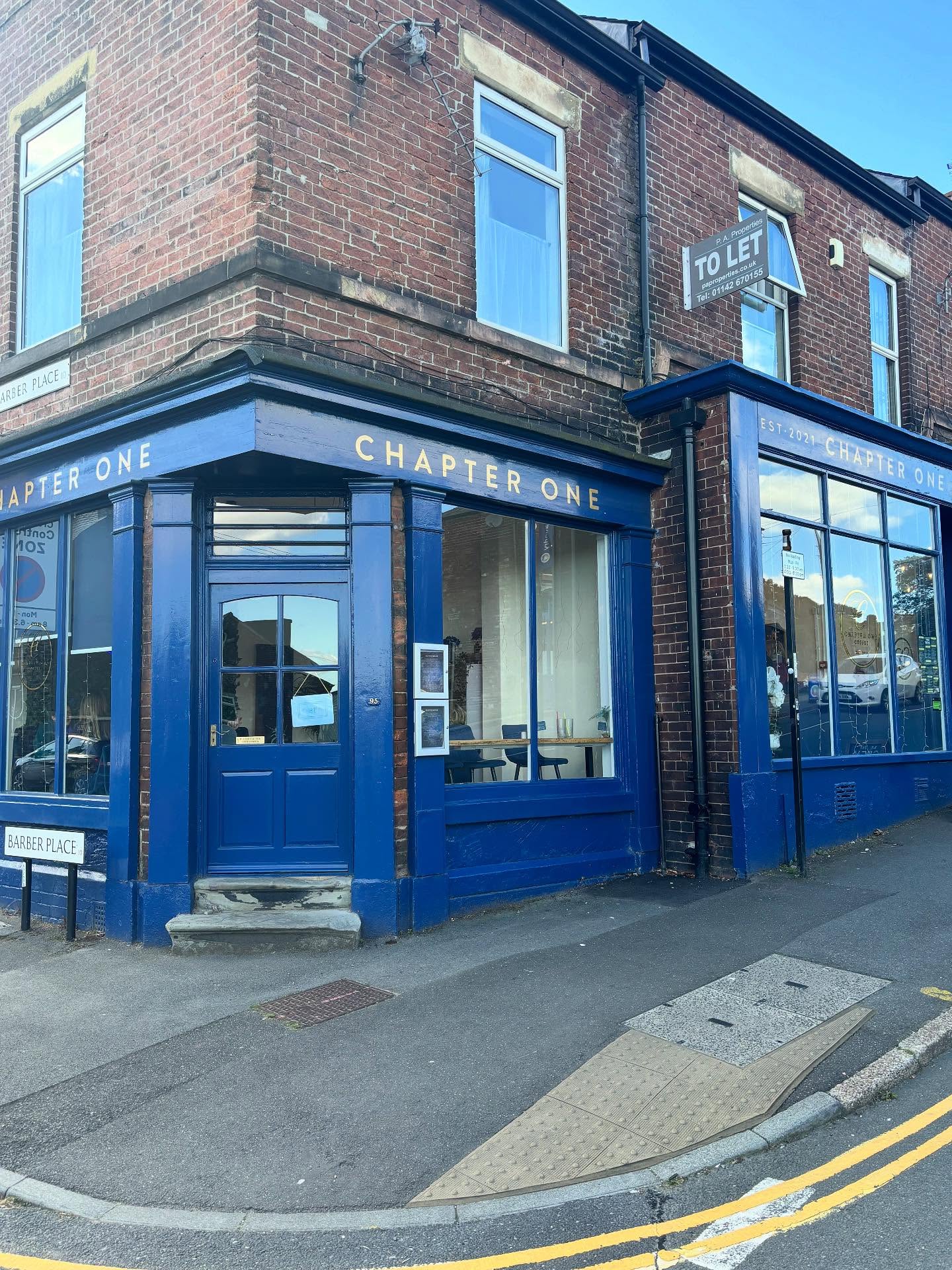 The blue Chapter One shopfront in Sheffield